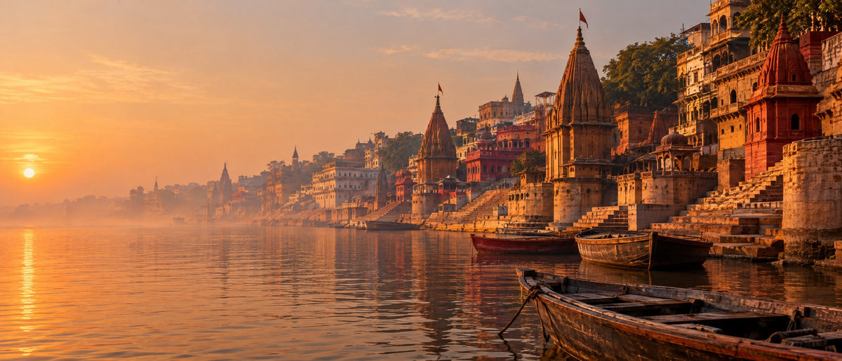The ghats of Banaras at sunrise, seen from the river Ganga