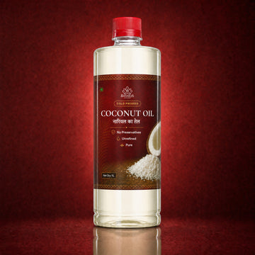 Banaras Foods cold-pressed coconut oil bottle on a crimson background
