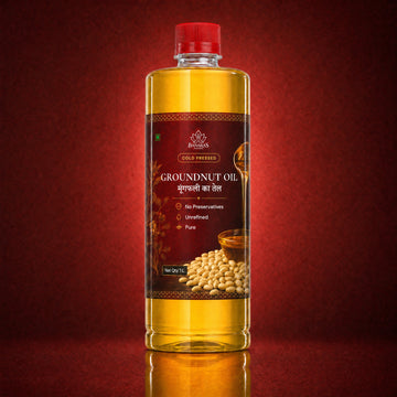 Banaras Foods cold-pressed groundnut oil bottle on a crimson background